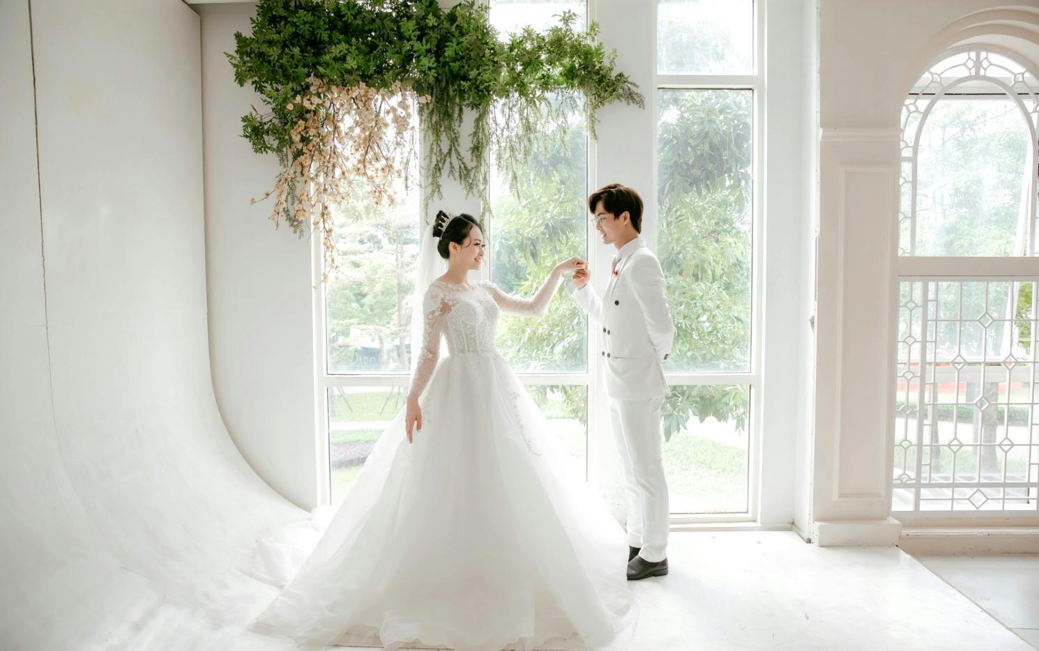 Event coordinator reviewing venue layout plans with detailed scheduling documents